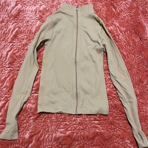 ASOS DESIGN seamless long sleeve zip through top in rib camel